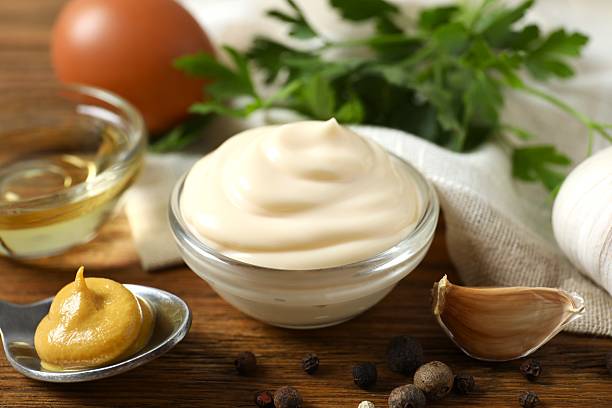 istock Bowl with mayonnaise and ingredients for cooking on the table 2251763967