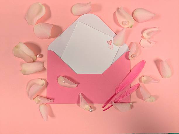 istock On a horizontal pink background is an envelope with space for a letter. 2251764511