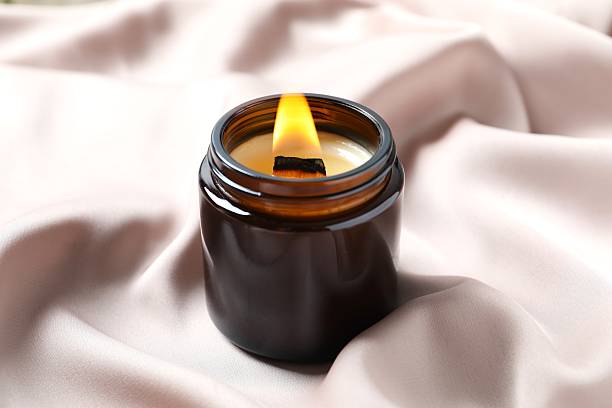 istock Aromatic soy candle on silk fabric 2251766520