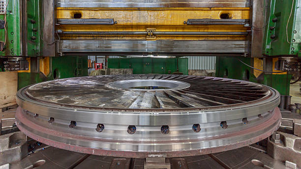 istock The assembling process of big steam turbine in a factory workshop. 2251771074