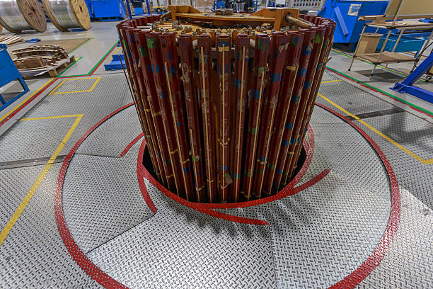 Assembly of transformer core in the factory workshop. Production of power equipment manufacture.