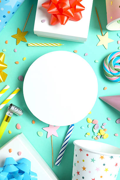 istock Frame of different party items and decorations with paper card on blue background, flat lay 2251773246