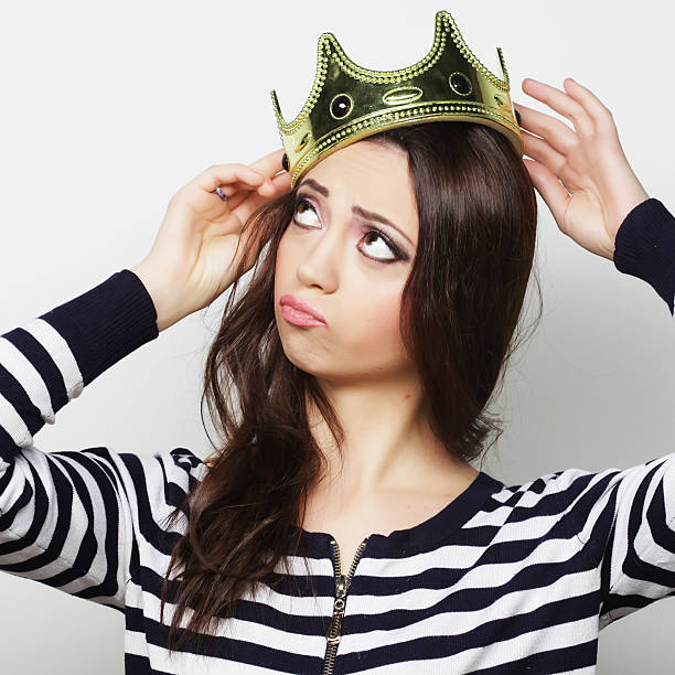 istock Happy woman with crown 2251776269