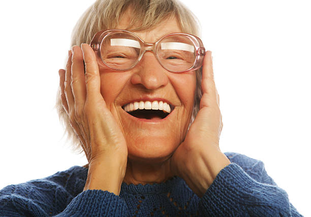 istock Happy surprised senior woman looking at camera 2251776638