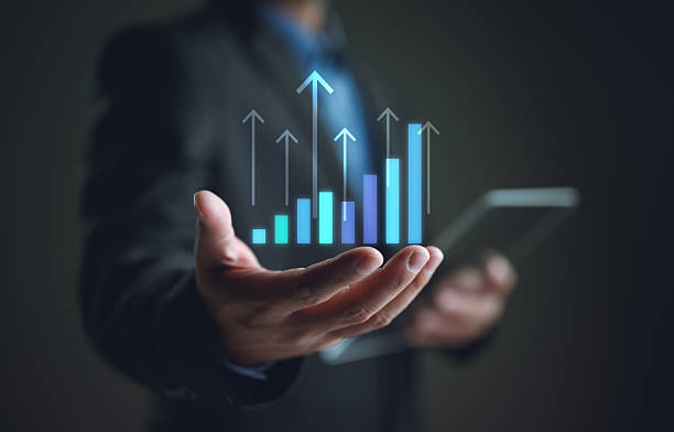 istock Hand holding growth business strategy arrow concept on success target improvement with increase development graph profit or economy investment income target and goal increase achievement. 2251777116