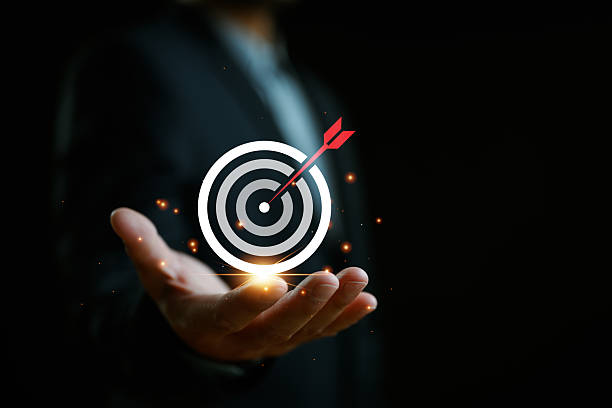 istock Targeting business concept. Businessman hold virtual target icons for business objective. Strategic planning for business growth and target customer group. set up business objective target goal. 2251777978