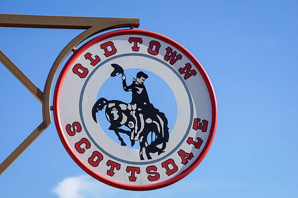 Old Town Scottsdale overhead circular sign hanging below the blue skies of Arizona