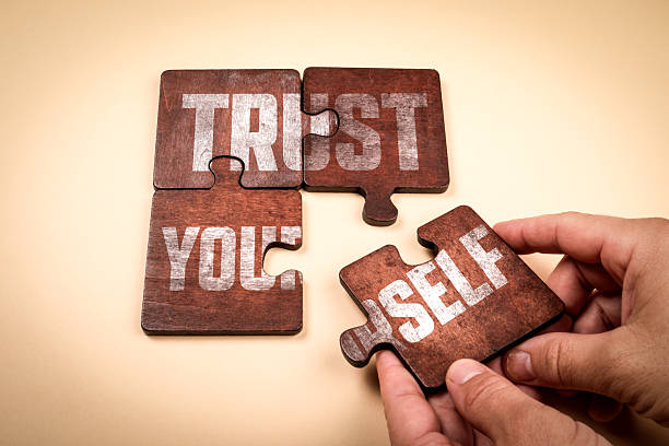 istock Trust Yourself Concept Illustrated With Puzzle Pieces Showing Trust Your Self Text 2251780556