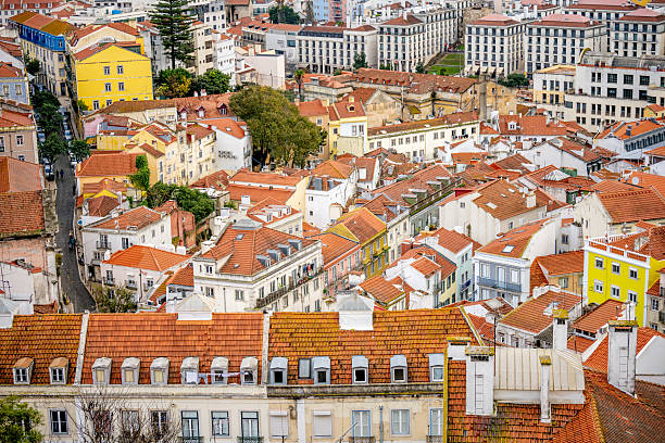 istock Lisbon hillside rooftops and dense residential buildings 2251780599