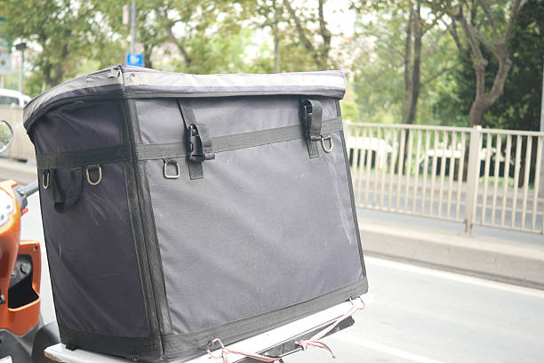 istock Delivery box on motorcycle parked by the street 2251781420