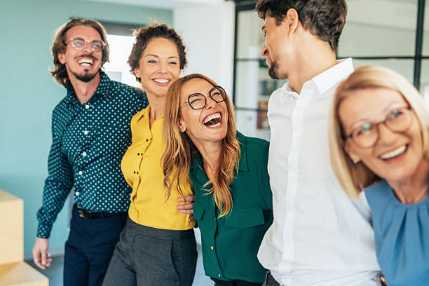 istock Business team embracing after achieving goals 2251782585