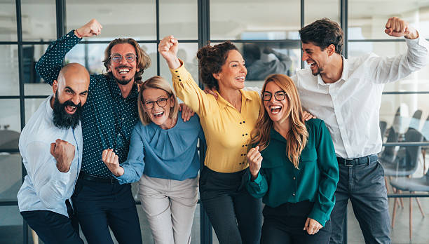istock Business team celabrating after achieving goals 2251782586