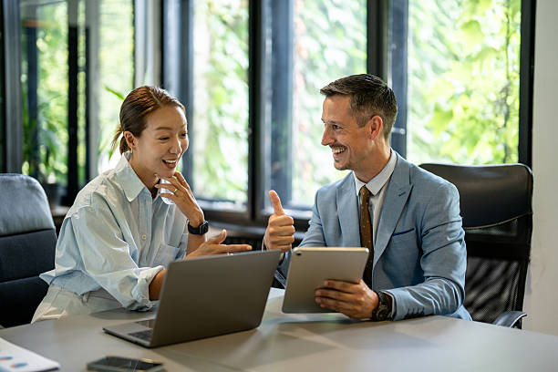 istock Business professionals collaborating in modern office 2251785334