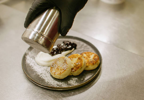istock Cooking breakfast syrniki roasted chef sour cream 2251786293