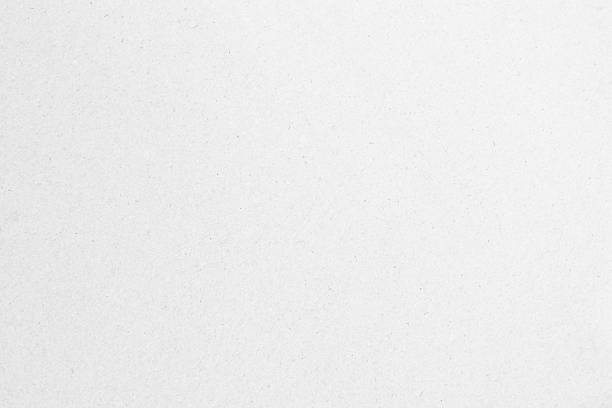 istock White recycled craft paper texture as background. Grey paper texture, Old vintage page or grunge vignette of old newspaper. Pattern rough art creased grunge letter. Hardboard with copy space for text. 2251786345