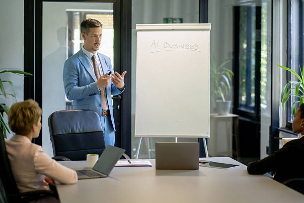 istock Businessman leading a meeting about artificial intelligence in the office 2251786452