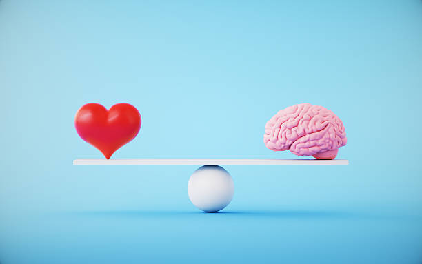 istock Pink Human Brain and Red Heart On White Seesaw 2251790305