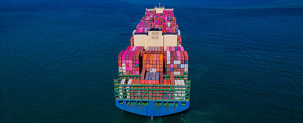 istock container ship, fully loaded with goods, sails out to sea, delivering products to various locations 2251803894