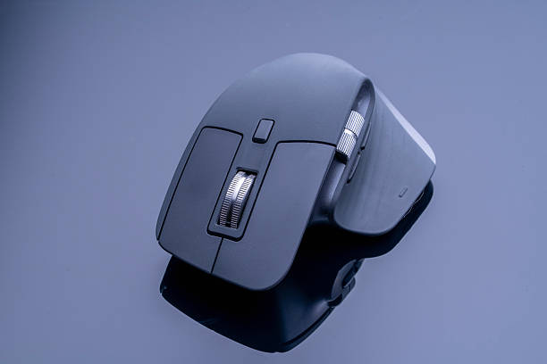 istock Top computer mouse for designers on a black background with reflection. Professional mouse for working in graphic editors. Wireless computer mouse. 2251810760