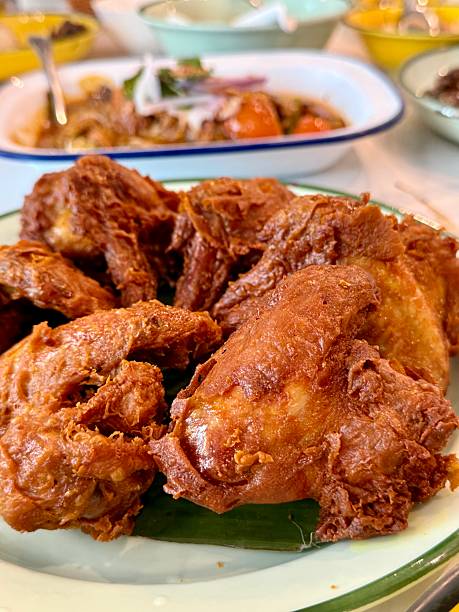 Deep fried chicken wings in Peranakan or Nyonya flavour