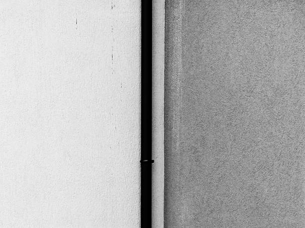 Two walls and metal pipe