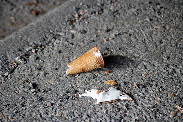 istock A dropped ice cream on the ground 2251816101