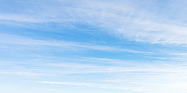 istock Blue sky with white cirrus clouds on a daytime 2251817385
