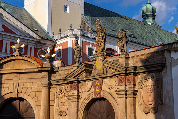 istock Ornate Broumov Monastery entrance gateway with religious statues 2251817988