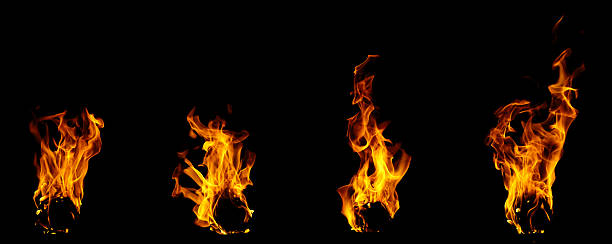 istock Realistic fire flames isolated on black background, burning effect with glowing orange heat. Perfect for overlays, design, visual effects, danger concepts, or dramatic backgrounds. 2251818132