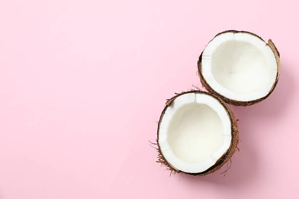 istock Coconut on color background, top view 2251818492