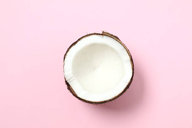 istock Coconut on color background, top view 2251818496