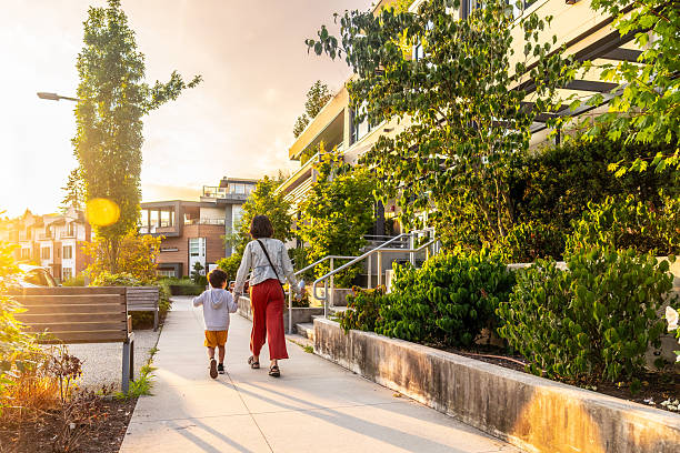 istock Mother and son walking in vancouver at sunset 2251819238