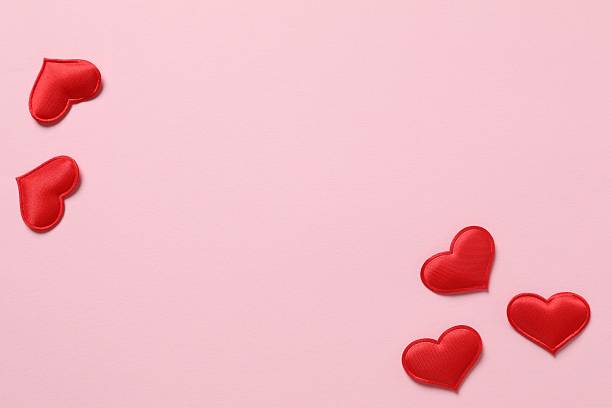 istock Red hearts on color background 2251819884