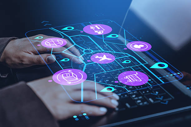 istock Digital supply chain management interface with logistics icons over hands typing on keyboard in futuristic technology concept on dark background. 2251820201