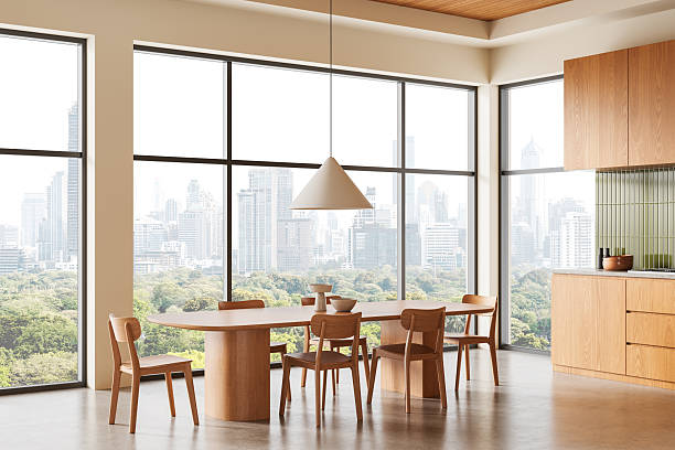 istock Modern wooden dining interior with panoramic windows overlooking city skyline in minimalist natural light setting. 3D Rendering 2251820363