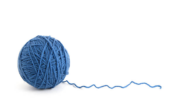 istock Ball of yarn on white background 2251822219