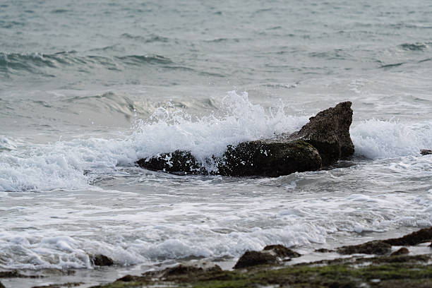 istock White-capped sea waves on the shore 2251822992