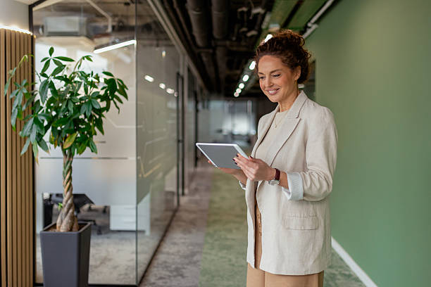 istock Confident Female Mature Professional Working on Tablet 2251824347