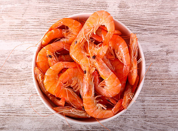 istock Cooked shrimps in white bowl 2251826894
