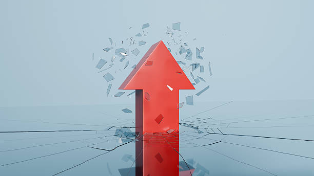 istock Large red arrow breaking through a shattering glass surface, symbolizing breakthrough, financial growth, and market disruption, 3d render 2251829277
