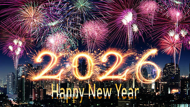 istock Sparkler 2026 text colorful firework illumination on dark blue sky background, happy new year 2026 concept 2251829793