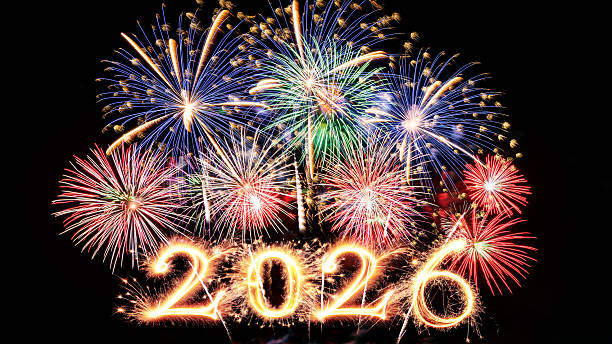 istock Sparkler 2026 text colorful firework illumination on dark blue sky background, happy new year 2026 concept 2251829799