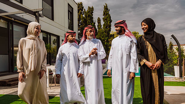 istock Arab multi-generational family gathering and discussing outdoors 2251831182