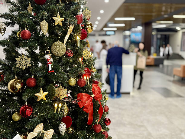 istock Holiday Tree At Transit Hub, Seasonal Display With Illuminated Christmas Tree, Christmas Themed Ornamentation With Sparkling Lights And Reflective Surfaces In Transit Environment 2251832462