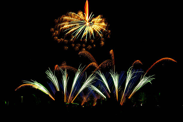 istock Colorful fireworks stock photo display exploding in dark night sky, festive celebration background with copy space. 2251833752