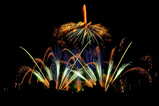 istock Colorful fireworks stock photo display exploding in dark night sky, festive celebration background with copy space. 2251833754