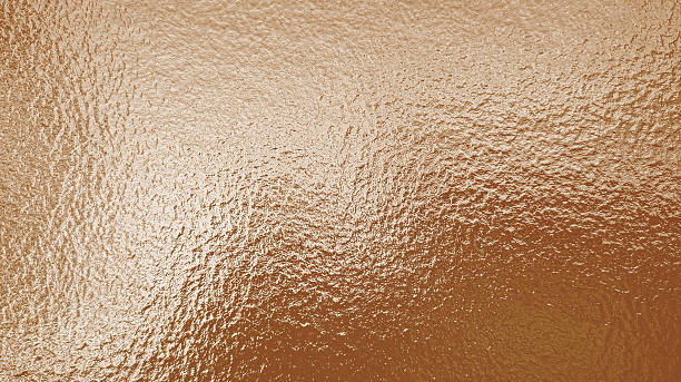 istock Seamless copper foil texture grainy luxury metallic bronze sheet abstract background 2251836260