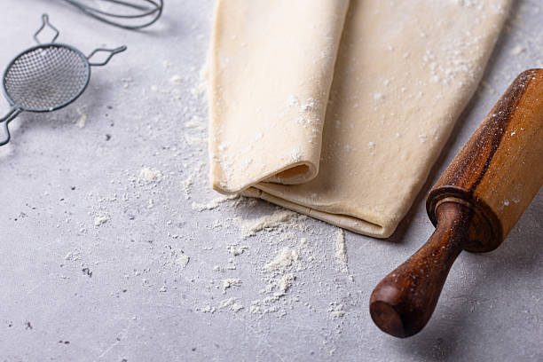 istock Raw puff pastry dough with baking ingredient 2251836549