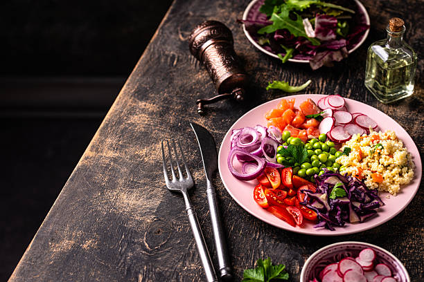 istock Balanced healthy bowl with vegetables and salmon 2251836671