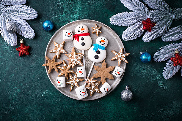 Christmas candy marshmallow in shape of snowman. Festive food